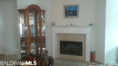 Wood burning fireplace and vaulted ceiling in the 