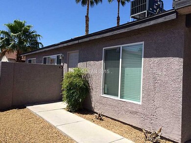 Facade/Exterior Front. WALKWAY TO SIDE ENTRANCE
