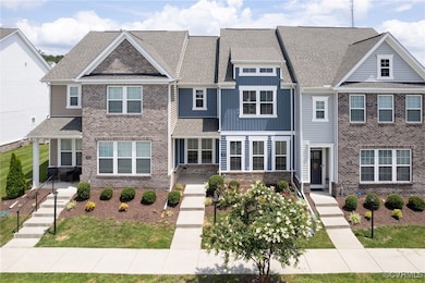 View of front of property featuring brick siding a