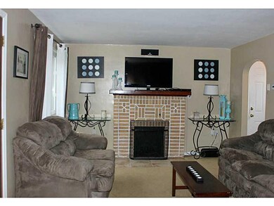 Living Room. Working log burning fireplace. Lots o