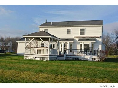 Backyard covered deck area and  open deck with awn