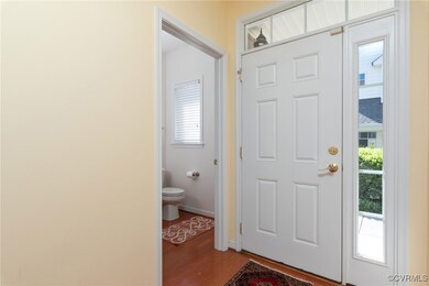 Entrance foyer featuring hardwood