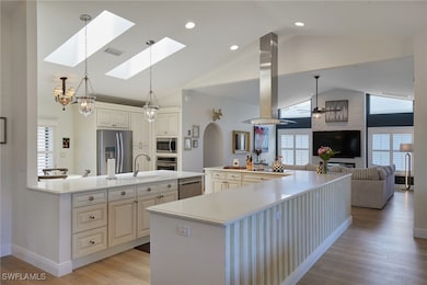 Kitchen with stainless steel appliances, island ex