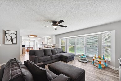 Spacious Family Room with Bay Window. Newer Blinds