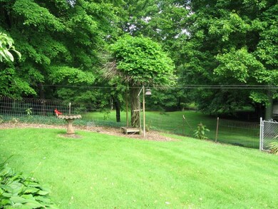 View #2 of fully fenced backyard.
