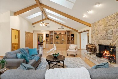 Vaulted Beamed Ceilings with Skylights.