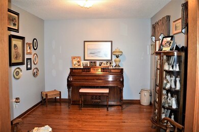 To the right of the foyer is the 10x12 formal dining room. Currently being used as a music room. Would also make a great formal living room.
