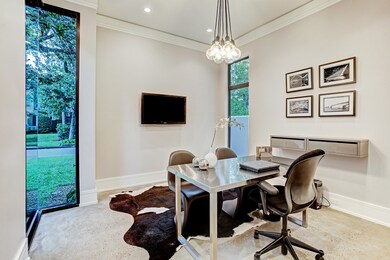 To the front of the home is a private study with b