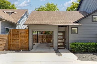 Property entrance with roof with shingles