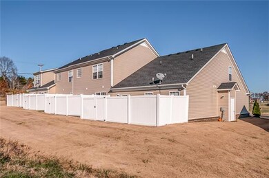 Completely fenced-in, this private perimeter encases the rear patio accessible via exterior gate and from the home a sliding glass rear door....