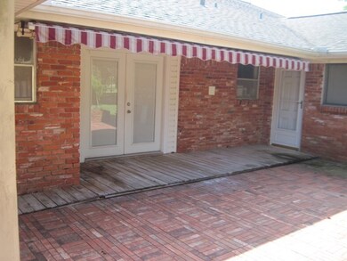 Back patio with working sun canopy