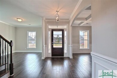 FOYER ENTRY: DINING ROOM TO LEFT WITH COFFER CEILI