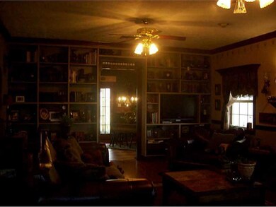 Living Room. BUILT IN BOOK SHELVES