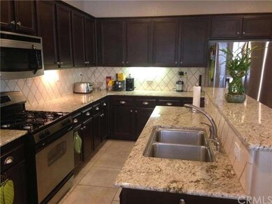 Granite Countertops, backsplash, gas stove/oven. T