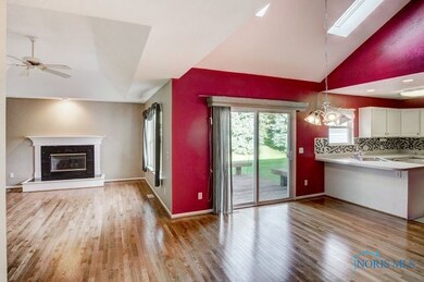 Gleaming hardwoods in the Living & Dining areas.