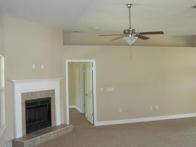 living room with plant shelf