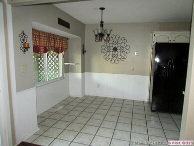 Kitchen has fresh paint and appliances