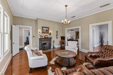 Front living area has original old coal burning fi