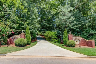 Picturesque entry with millstone detail