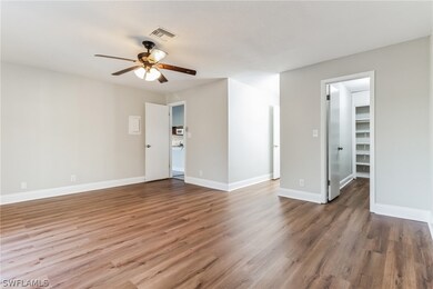 Unfurnished room with wood-type flooring and ceili