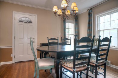 Formal Dining Room Features Hardwood Floor,   Smoo