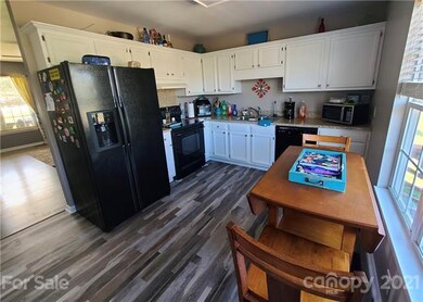 White kitchen with breakfast area!