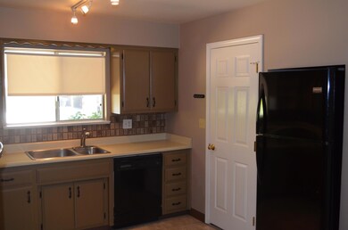 Kitchen, door to garage, refrigerator