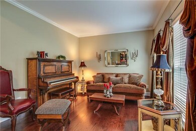 The Living Room is a wonderful space to curl up with a book. Need an office? Easily add french doors for privacy for your office or library.