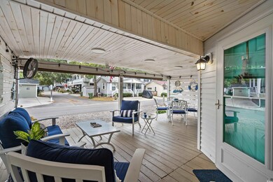Wooden deck featuring outdoor lounge area