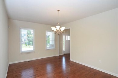 Generous size dining room with Oak hardwoods. Cust