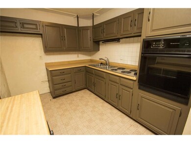 Great cabinet and counter space, full tile backspl