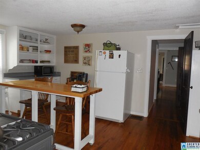 Updated and spacious kitchen with hardwoods and ap