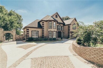 Circle drive with lots of parking! So many custom details inside & out! 