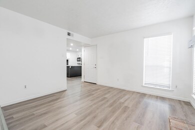 Empty room with light wood-type flooring