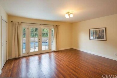 Large master bedroom with remodeled bath open to p