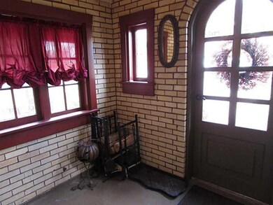 Entry/Foyer. The Charming Enclosed Front Porch, a 