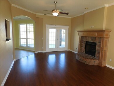 Living room with french doors that open out to the