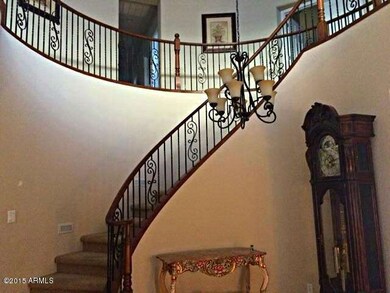 Curved rod iron staircase
