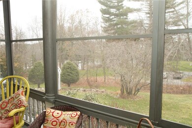 It overlooks the sloping yard with...