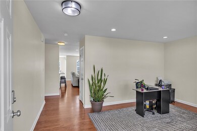 Home office featuring hardwood / wood-style floors