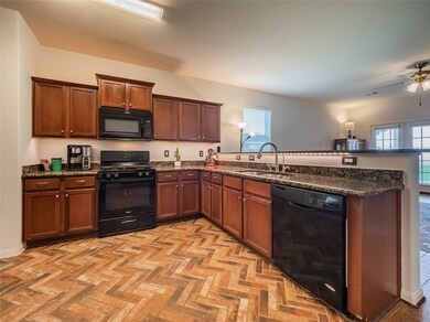 this is beautiful herringbone brick flooring in th