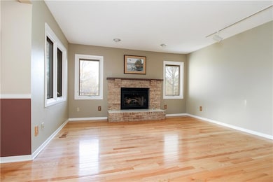Main level living room with fireplace