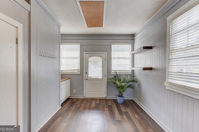 main level bedroom/office/play room with full bath