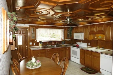 Kitchen with beautiful wood work and crown molding