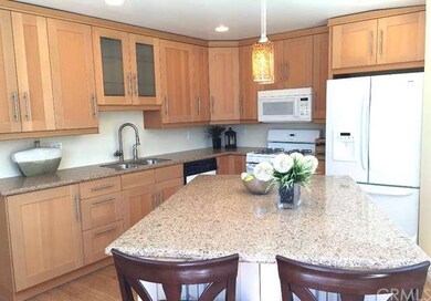 Look at the gorgeous kitchen with slab granite cou
