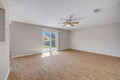 Spare room featuring light wood finished floors a