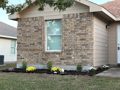 View of property exterior featuring a shingled roof and a yard