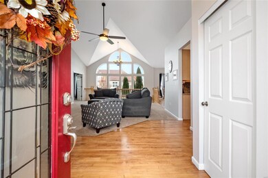 Enter through the front door into to the foyer, of
