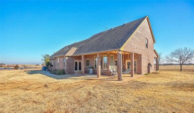Outstanding Outdoor Living! Lovely wrap-around covered patio.
