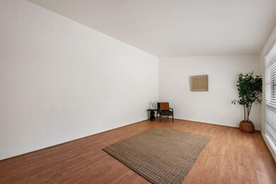Unfurnished room with wood finished floors